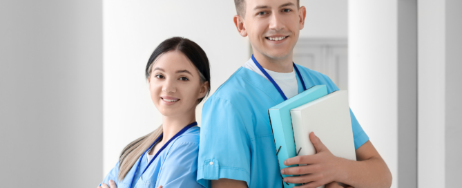 Skilled orthodontic assistants smiling after effective orthodontic training and onboarding